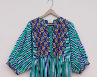 Vestido midi de algodón hecho a mano, con dos bolsillos laterales, ideal para el verano.