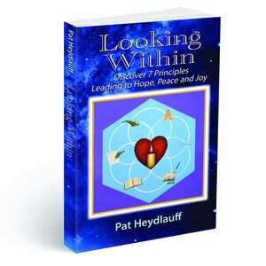 May include: A hardcover book titled "Looking Within" with a blue and white starry background. The cover features a geometric design with a red heart and a lit candle. The author's name, Pat Heydlauff, is visible.