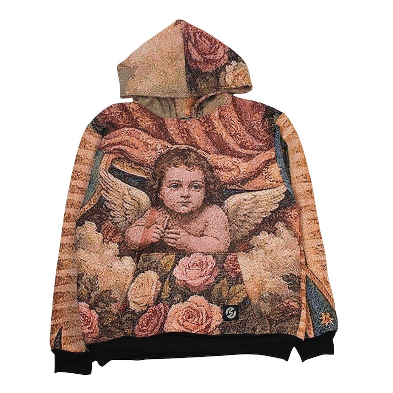 May include: A long-sleeve hoodie featuring a woven tapestry-style design with a central cherub figure, wings, and floral rose patterns in shades of pink, gold, and tan. The garment includes a black ribbed hem and cuffs, and a small black logo patch.