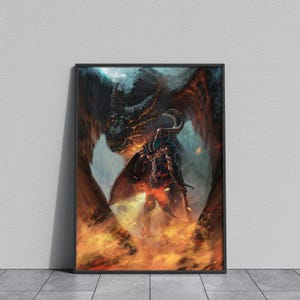 May include: Framed fantasy art print depicting a warrior facing a dragon. The artwork features a detailed illustration with a fiery background, a menacing dragon, and a warrior in armor. The color palette includes shades of orange, blue, and black.