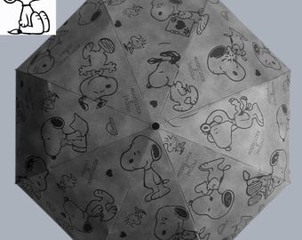 Paraguas de Snoopy: Plegable automáticamente, con protección UV.