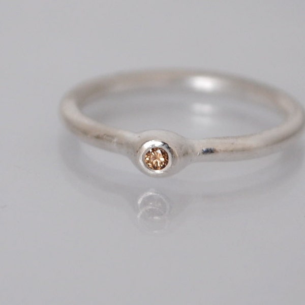 Silver and brown diamond engagement ring