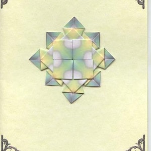 Cartolina d'auguri con una bustina piegata medaglione design