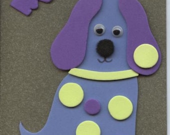 Greetings card with blue spotty dog design