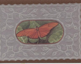 Greetings card with butterfly and hand pierced border