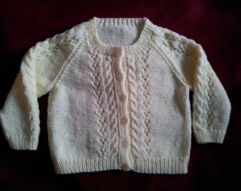 Hand knit childs cardigan in lemon, size 27 inch