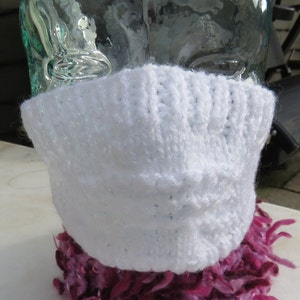 Hand knitted ski mask in white with glitter thread