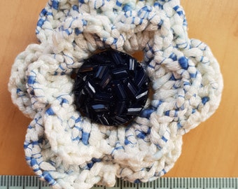 1227, Irish crochet flower brooch in blue and white yarn with vintage style button centre