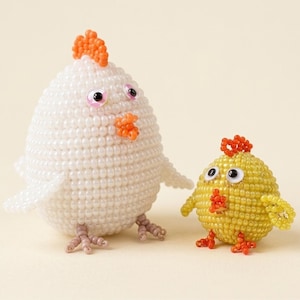 May include: A handmade wooden sign with the text "Welcome" in a playful font. The sign is painted white with a distressed finish, and features a decorative floral design in shades of pink and green. It is designed to be hung on a door or wall.