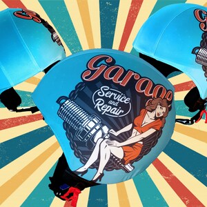 May include: Three blue helmets with a retro design. The helmets have a graphic of a woman in a red dress and a spark plug with the text "Garage Service and Repair".