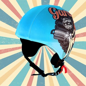 May include: A blue bicycle helmet with a graphic of a vintage car part and the text "Garage Service and Repair".