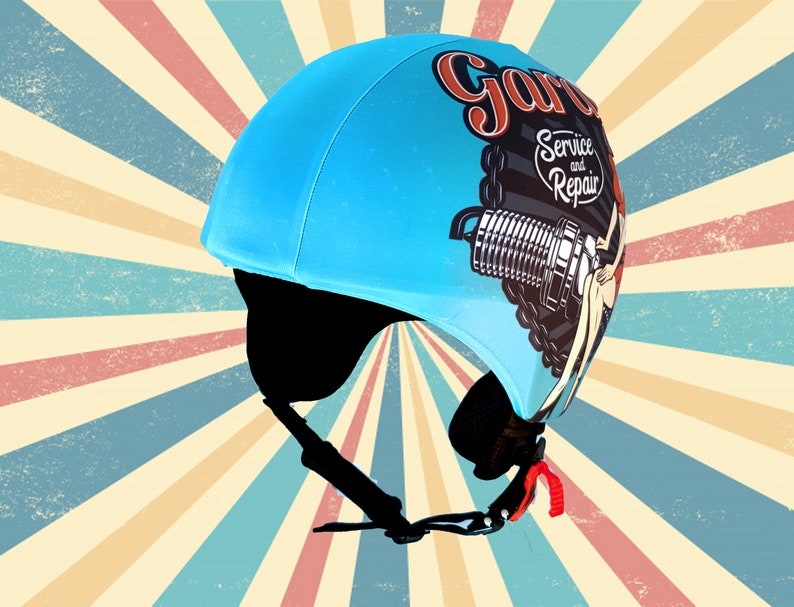 May include: A blue bicycle helmet with a graphic of a vintage car part and the text "Garage Service and Repair".