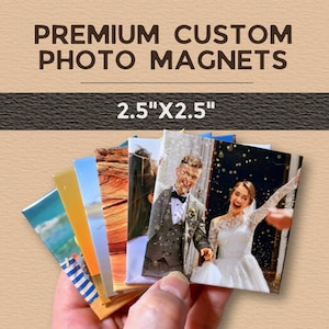 May include: A hand holding a stack of custom photo magnets. The magnets are 6.35cm x 6.35cm and feature various images, including a wedding photo. The text "PREMIUM CUSTOM PHOTO MAGNETS" is displayed at the top.