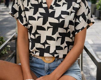 Elegante zomerblouse dames print, casual kantoortop met v-hals vleermuismouwen