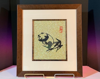 Hand-Cut Paper Panda Art, Minimalist Bamboo Silhouette, Glimmering Gold Background