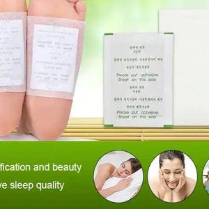 May include: Foot pads with text, applied to the soles of feet. The pads are white with text. The image also shows a package with text that says "Please put adhesive sheet on this side." The image also includes the text "Detoxification and beauty" and "Improve sleep quality."