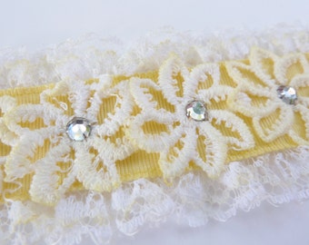 White Daisy Appliqued on Yellow Ribbon with Rhinestone Centers & Ruffle Edge Lace Trim