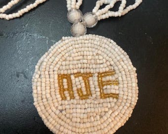 AJE Necklace Black Or Gold Lettering Ileke Eleke With Luxurious White Glass Beads