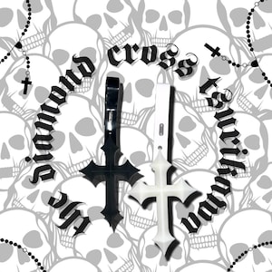 May include: Black and white cross-shaped pendants with the text "the stunning cross tattoo" in a gothic font. The background features a pattern of gray skulls and a rosary.