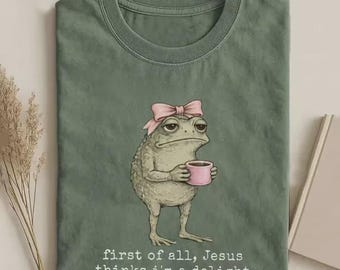 First Of All Jesus Thinks I’m A Delight Shirt, Funny Christian Frog T-Shirt, Frog With Bow Coffee Shirt, Cute Retro Christian Graphic Shirt
