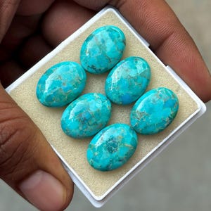 AAA+ Mohave Turkos Cabochon: Oval Platt Ädelsten bild 11
