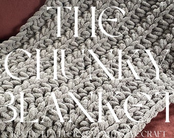 May include: A gray chunky knit blanket with the text "THE CHUNKY BLANKET" in white.