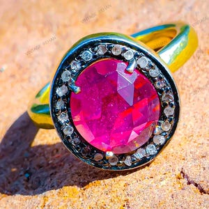 92.5 Silver Single Cut Diamond And Glass Filled Ruby Sterling Ring