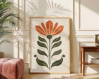 May include: A rectangular wall art print featuring a stylized orange flower with a dark green stem and symmetrical leaves on a cream background, enclosed in a light wood frame, displaying a clean graphic design with bold, flat color shapes.