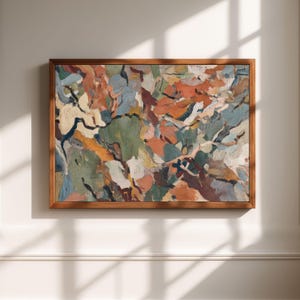 May include: A rectangular framed painting featuring an abstract composition with thick, textured brushstrokes in shades of terracotta, sage green, slate blue, cream, and dark brown, enclosed within a simple, medium-toned wooden frame.