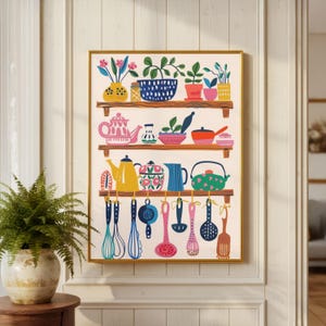 May include: A framed print showcasing a vibrant kitchen illustration. The artwork displays shelves with potted plants, teapots, bowls, and hanging kitchen utensils. The colour scheme includes yellow, pink, blue, and green, creating a cheerful and inviting aesthetic.