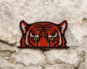 Tiker-opstrijkborduurpatch