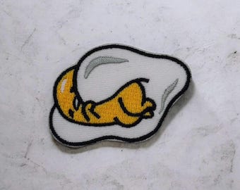 Opstrijkbare borduurpatch ei
