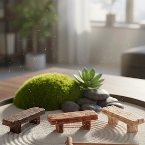 May include: A miniature zen garden featuring three small wooden benches, a mossy hill, and a succulent plant. The garden is raked with a small wooden rake, creating patterns in the sand. The scene is set on a wooden tray.