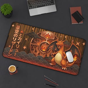 May include: A rectangular mousepad featuring a Charizard design with Japanese text. The mousepad has a brown wood-grain background with a circular emblem and flames. The Charizard is orange with black wings and a flame tail.