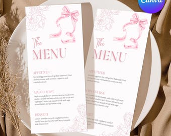 May include: Two white menu cards with pink text and floral accents. The cards feature a pink bow and the words "The MENU". The menu lists appetizers, main courses, and desserts. The Canva logo is visible in the upper right corner.
