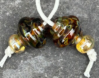 Smoky ornate lampwork glass bead pair