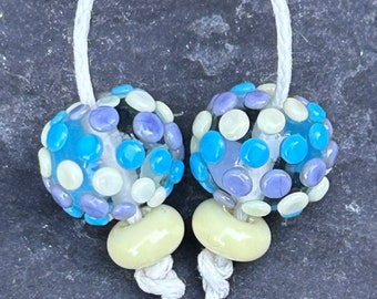 Turquoise, Cream & Lilac squished dot lampwork glass bead pair