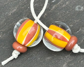 70s Kitsch stripe lampwork glass bead pair