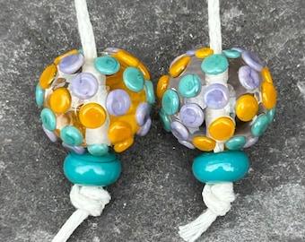 70s kitsch squished dot lampwork glass bead pair