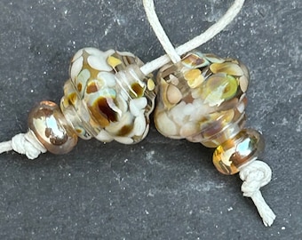 Raku ornate lampwork glass bead pair