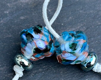 Koi ornate lampwork glass bead pair