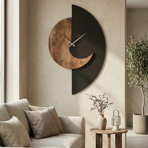 Minimalist wall clock combining natural wood and black metal, modern decorative wall clock for cozy living room