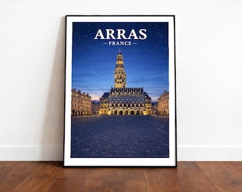 May include: Framed print featuring a nighttime view of Arras, France. The image showcases a large building with a tall tower, illuminated against a twilight sky. The word "ARRAS" and "FRANCE" are printed at the top.