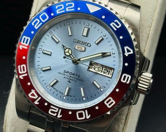 Vintage Seiko 5 automatisk herrarmbandsur: solblå urtavla, vattentålig jubileumsarmband