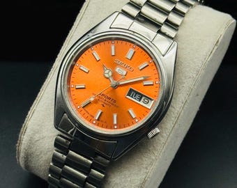 ビンテージ SEIKO5 自動巻き時計 ヴィンテージ セイコー5 自動巻き腕時計（1980年代製、オレンジ文字盤