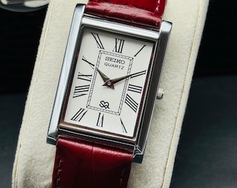 Reloj de pulsera vintage Seiko Slim Tank de cuarzo para hombre, correa de cuero hecha a mano.