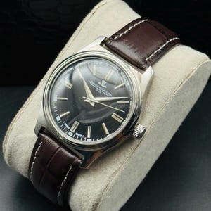 Reloj Jaeger-LeCoultre Club vintage: cuerda manual suiza restaurada, esfera negra