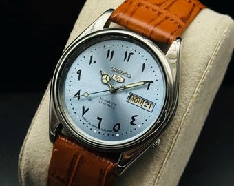 Vintage Seiko 5 automatisk herrarmbandsur: solblå arabisk urtavla