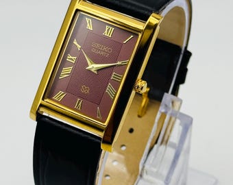 Remington Swiss Quartz Tank Gold Plated Watch White Dial  display picture 2