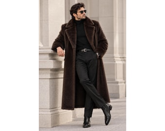 May include: A long, dark brown faux fur coat with wide lapels, worn over a black turtleneck sweater and black trousers. The outfit includes a black leather belt with a silver buckle and black leather boots. Dark sunglasses are worn on the face.
